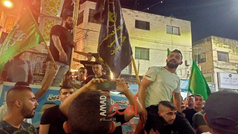 مسيرة ووقفة في مخيم جنين للمطالبة باسترداد جثامين الشهداء المحتجزة