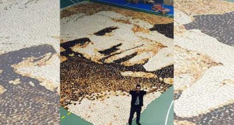 الفنان الفلسطيني  هاني خوري  يدخل موسوعة "غينيس" برسم لوحة من الخبز المحمص