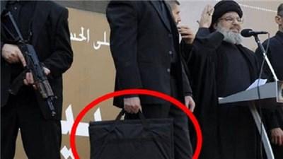 ماذا بداخل الحقيبة التي يحملها مُرافق نصر الله؟