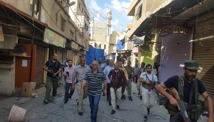 بالصور...بدء انتشار القوة المشتركة في حي الطيرة والشارع الفوقاني في مخيم عين الحلوة