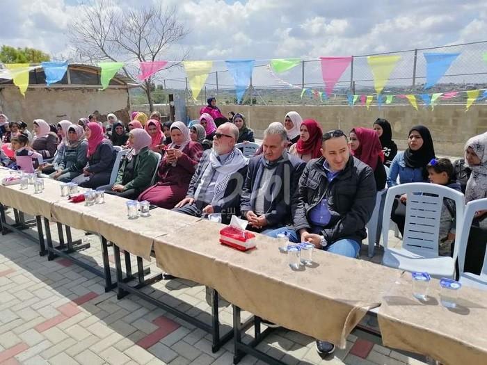 تربية قلقيلية تشارك مدرسة "الرماضين" المعزولة خلف جدار الفصل العنصري يومها المفتوح