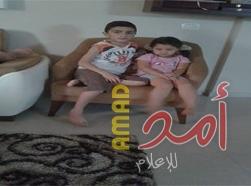 بالصور.. أطفال أسرة المعتقل الحلبي يتذكرون والدهم عند كل موعد افطار ويتمنون أن يحتضنوه قبل حلول العيد