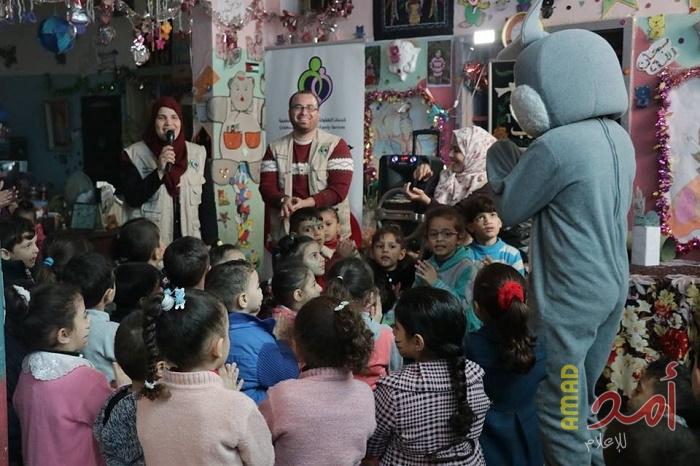 بالصور - "خدمات الطفولة" تنفذ حفلاً ترفيهية للأطفال في روضة "أحباب الله" بشرق غزة