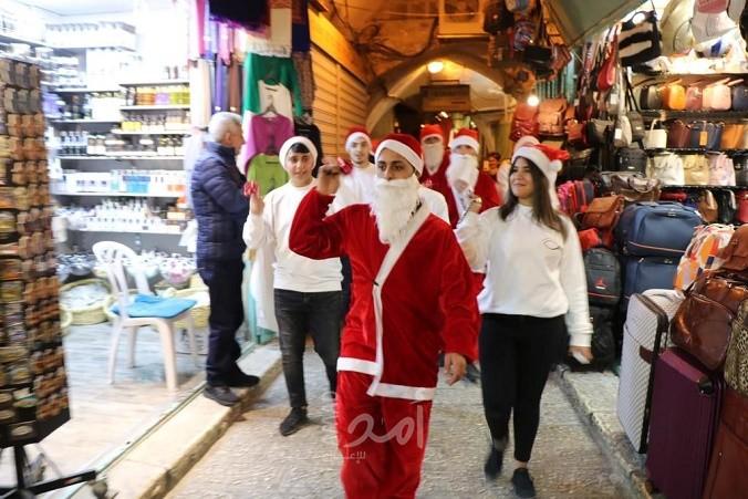 صور .. التجمع الوطني المسيحي يحي ليلة الميلاد في البلدة القديمة بالقدس