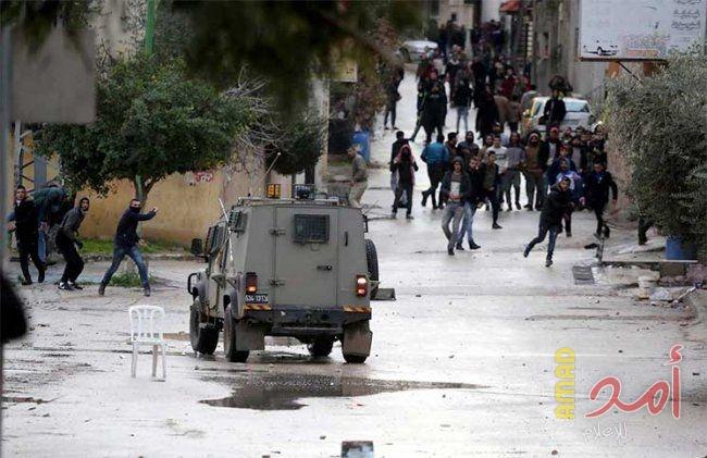 إصابتان بالرصاص الحي بمواجهات في المغير شرق رام الله