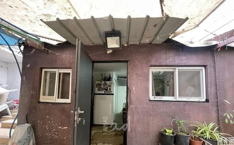 شرطة الاحتلال تجبر مقدسياً على إخلاء  منزله في "الشيخ جراح"- صور
