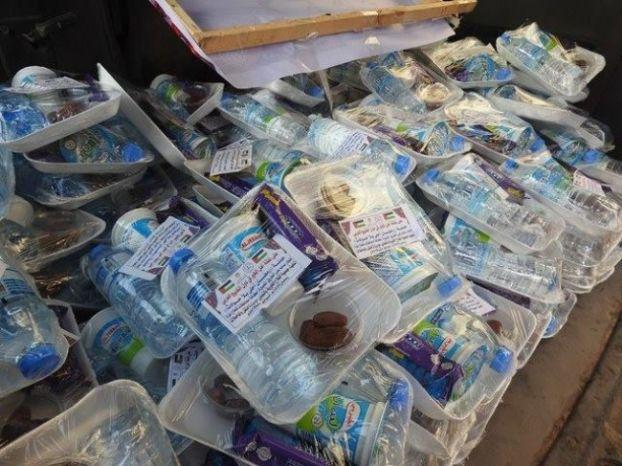"النقل والمواصلات" تبدأ حملة إفطار سائق بتوزيع تصبيرة على السائقين في غزة