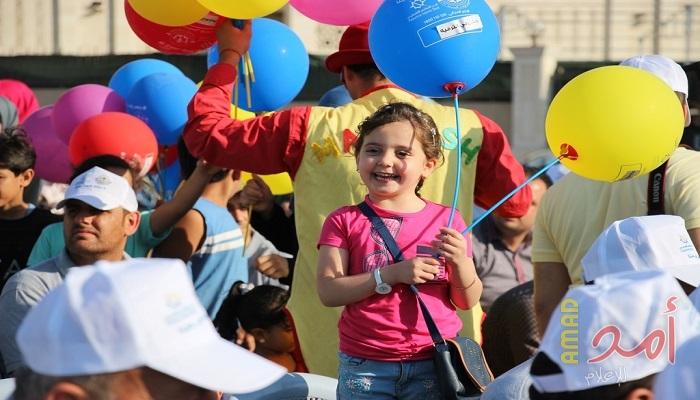 غزة: مركز الوفاء ينظم فعالية لرسم جدارية " خيرنا في كبارنا "
