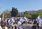 حماس: الإصرار على تسيير مسيرة الأعلام في القدس "صبّ للزيت على النار"