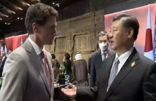 الرئيس الصيني يؤنب رئيس الوزراء الكندي وموسكو تعلق